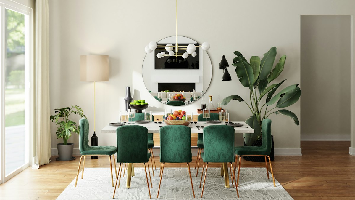 Elegant dining space with a designer wall treatment and jewel-tone seating