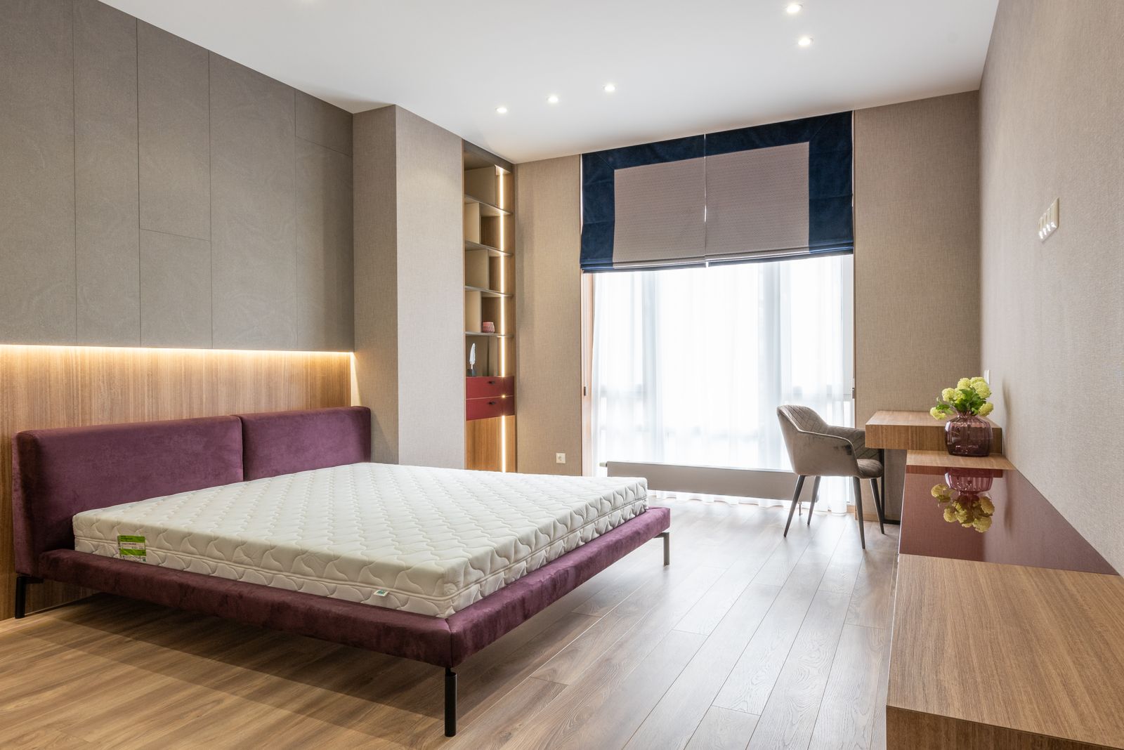 Serene bedroom interior with a soft, tailored wall finish and clean lines